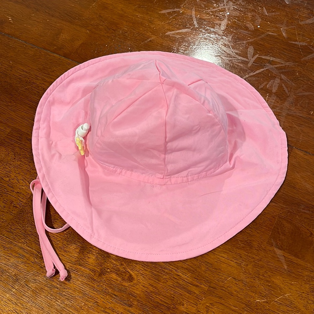 I Play pink summer water proof hat with ties. Size 6-18 months.
